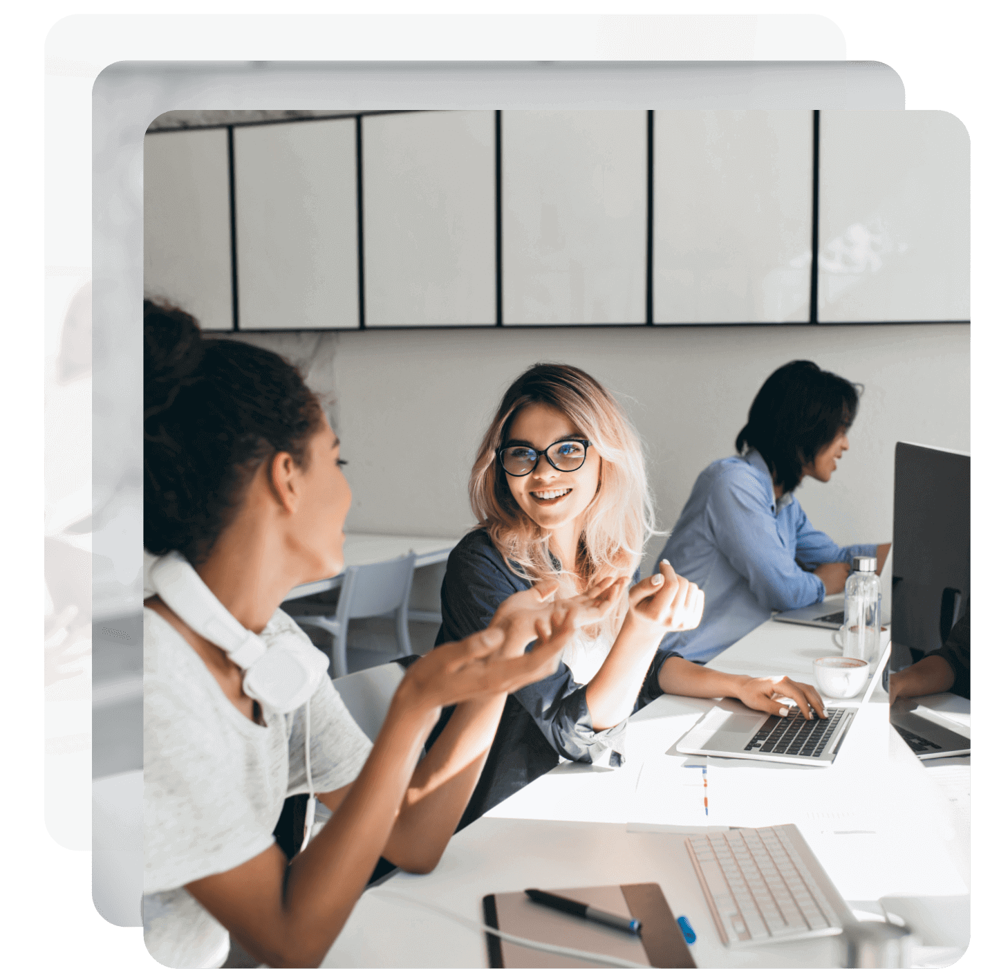 Employees talking to each other.